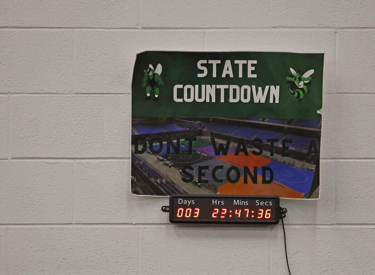 The Azle wrestling countdown clock shows a little less than four days to the state meet during one of the final practices at Azle High School in Azle, Texas, on Friday, Feb. 9, 2026.