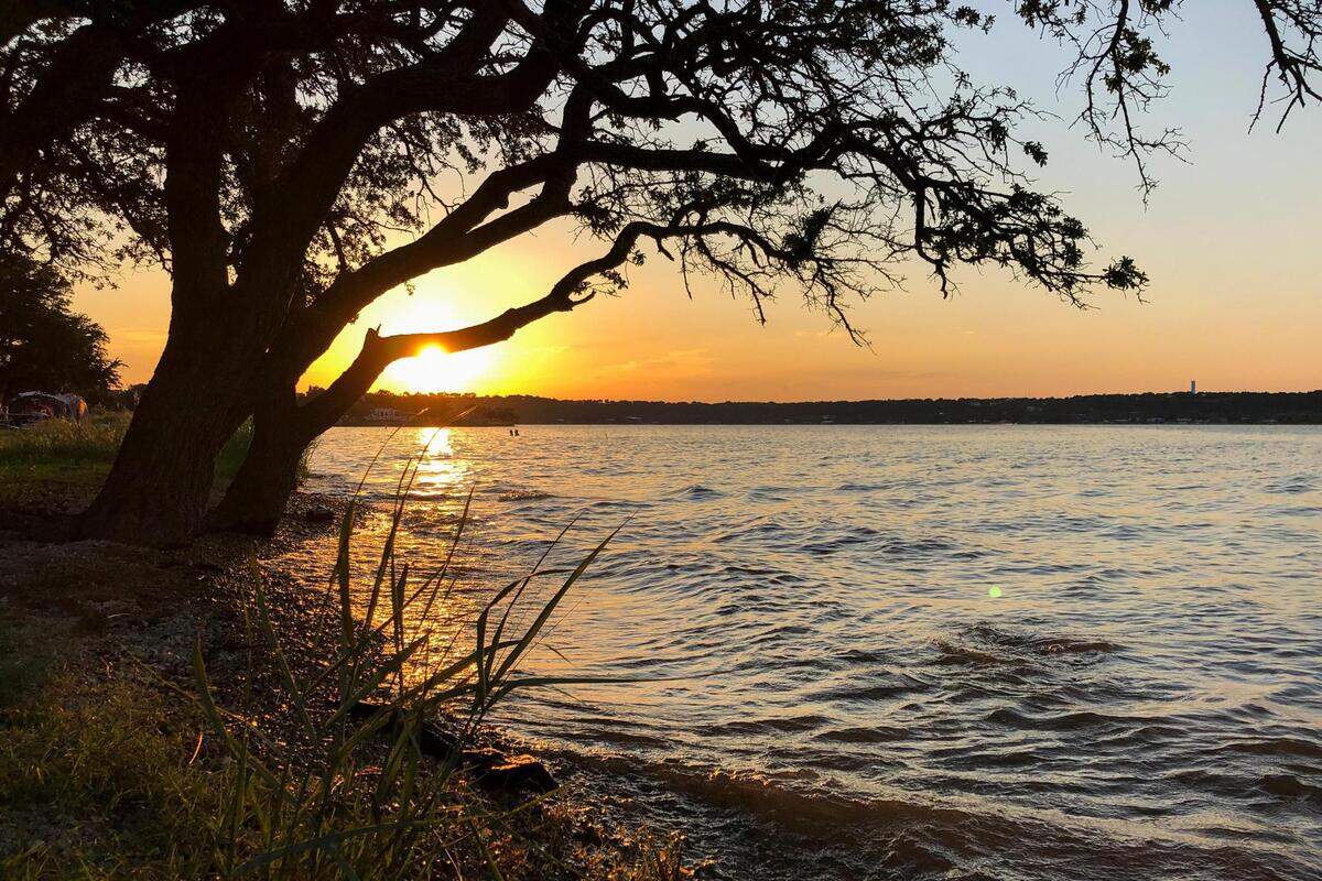 The sun sets on a summer day in Possum Kingdom State Park in Palo Pinto County.
