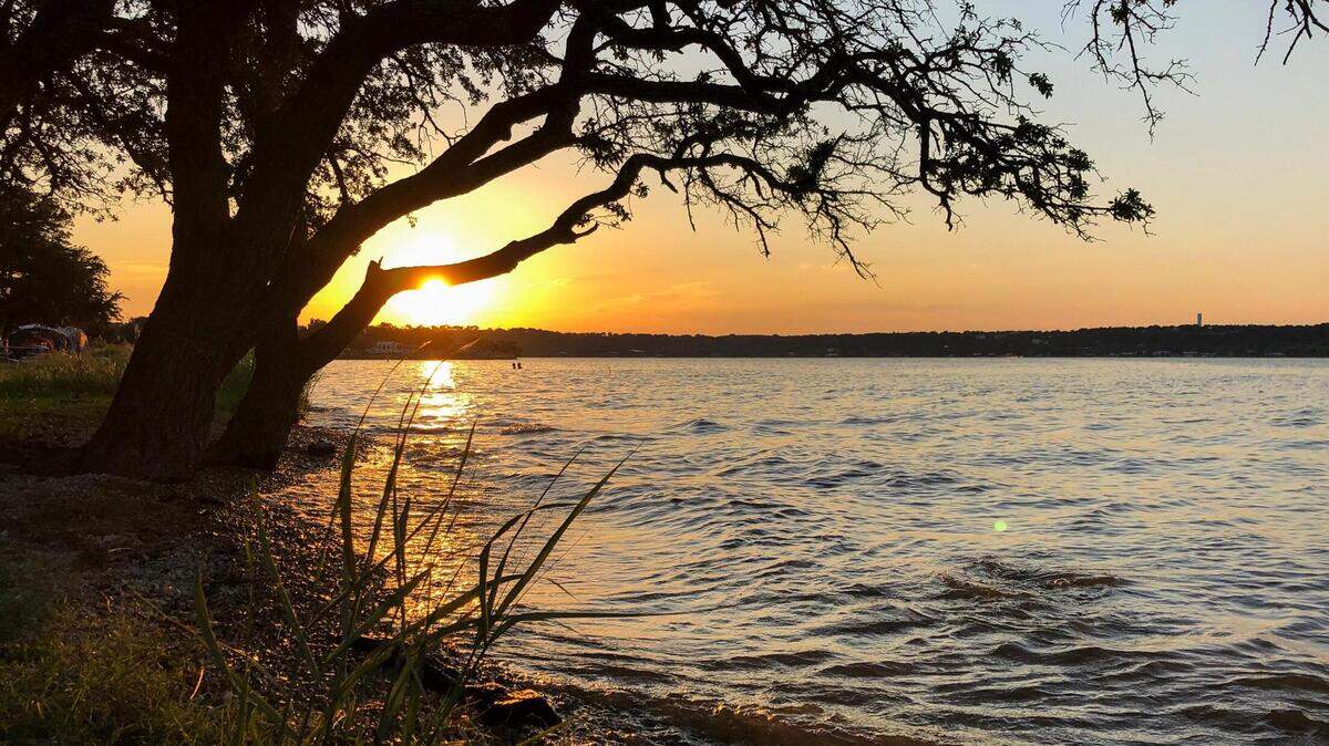 The sun sets on a summer day in Possum Kingdom State Park in Palo Pinto County.