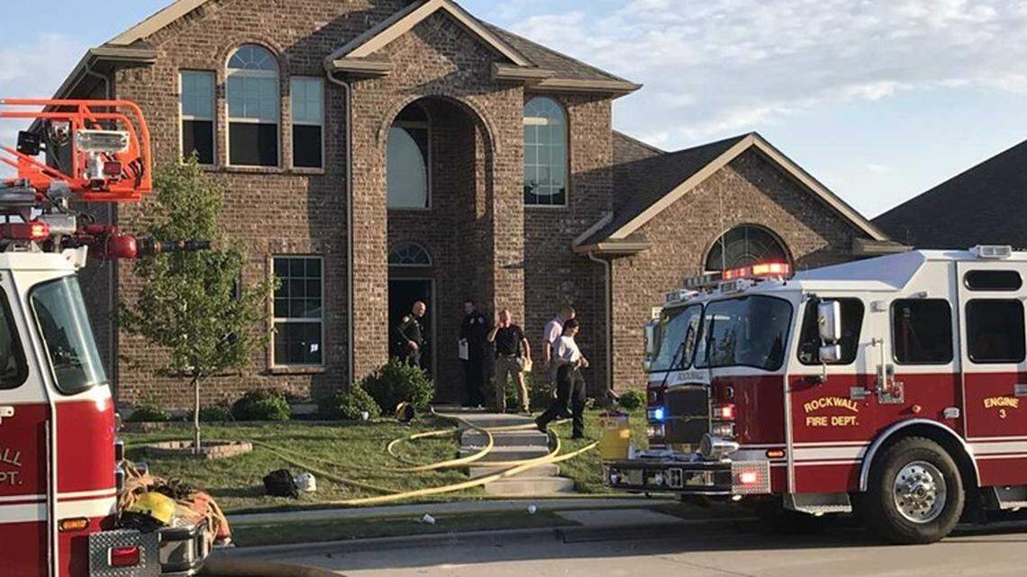 Rockwall fire fighters work the scene of a possible murder-suicide Monday morning.