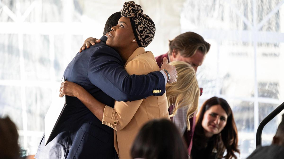 Tarrant County Commissioner Manny Ramirez hugs resident Timmie Smith after she shared her story at the grand opening of the Casa de los Sueños apartments in Fort Worth on Wednesday, Dec. 11, 2024. Smith, a single mother of five, experienced homelessness in 2012 and, through Fort Worth Housing Solutions, qualified to live in Casa de los Sueños, which offers permanent housing tailored to families with children experiencing homelessness.