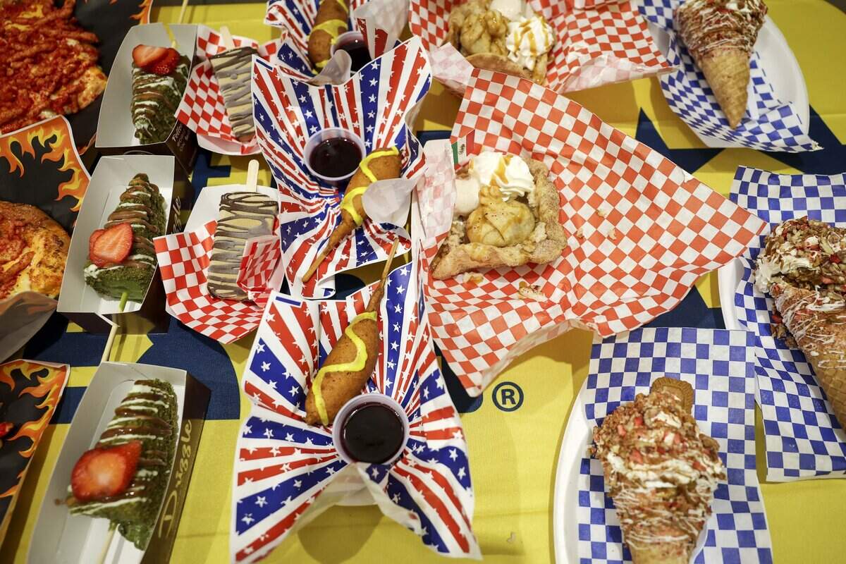 Dessert finalists are lined up on a table at the Big Tex Choice Awards on Tuesday, Aug. 18, 2026 in Dallas. The winner in the sweet category was Fletcher's Chocolate Corny Dog, chocolate fudge dipped in Fletcher's corn dog batter with a drizzle of yellow vanilla icing and served with raspberry compote.