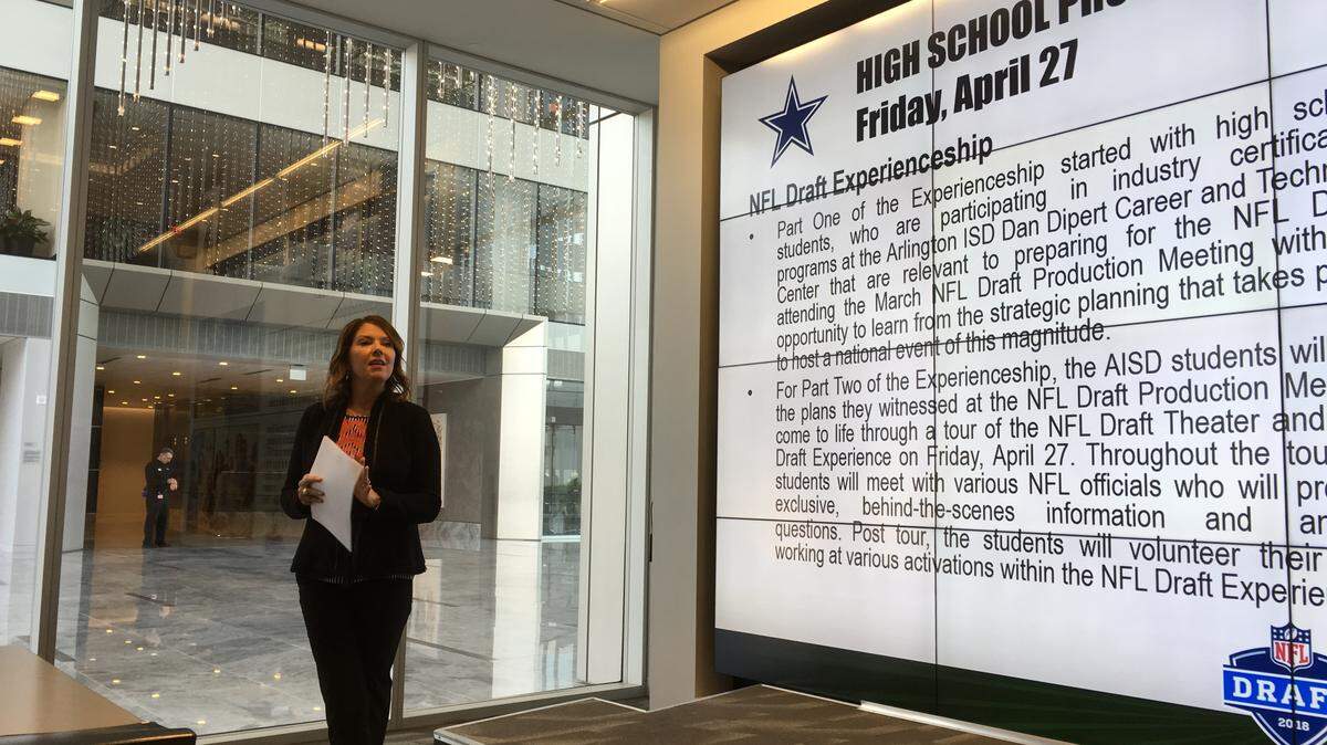 Emily Cruz Robbins, senior director of community relations and alumni affairs for the Cowboys, discusses events planned in Arlington and Mansfield during NFL Draft week, April 18, 2018 at Cowboys headquarters in Frisco, Texas.