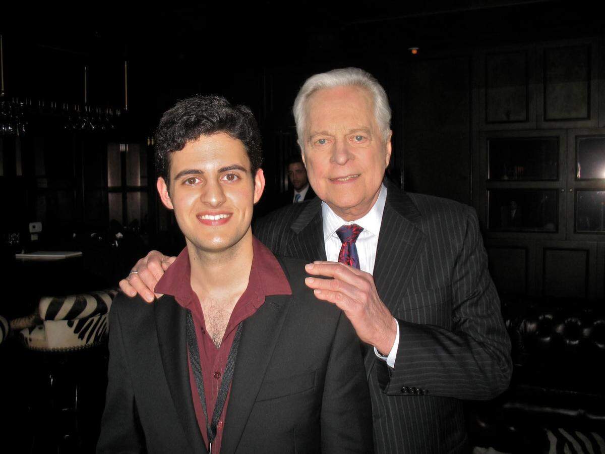 Ryan Bijan Jeri, left, founder of Cowtown Movie Classics, with longtime Turner Classic Movies host Robert Osborne. The old films he watched on TCM as a kid inspired Jeri to launch Cowtown Movie Classics in 2022.