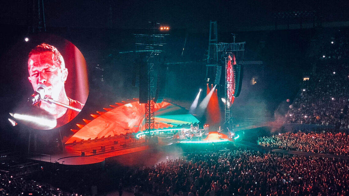 Led by Chris Martin, Coldplay makes the Cotton Bowl feel intimate with a powerful set