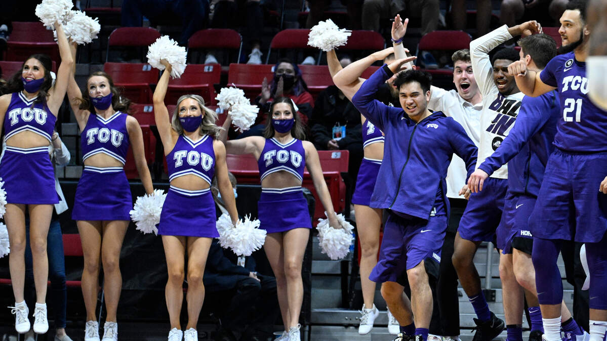 TCU players react on the bench next to cheerleaders during the Horned Frogs first round win over Seton Hall Friday in the NCAA Tournament in San Diego. Big 12 teams opened 6-0 in the tournament.