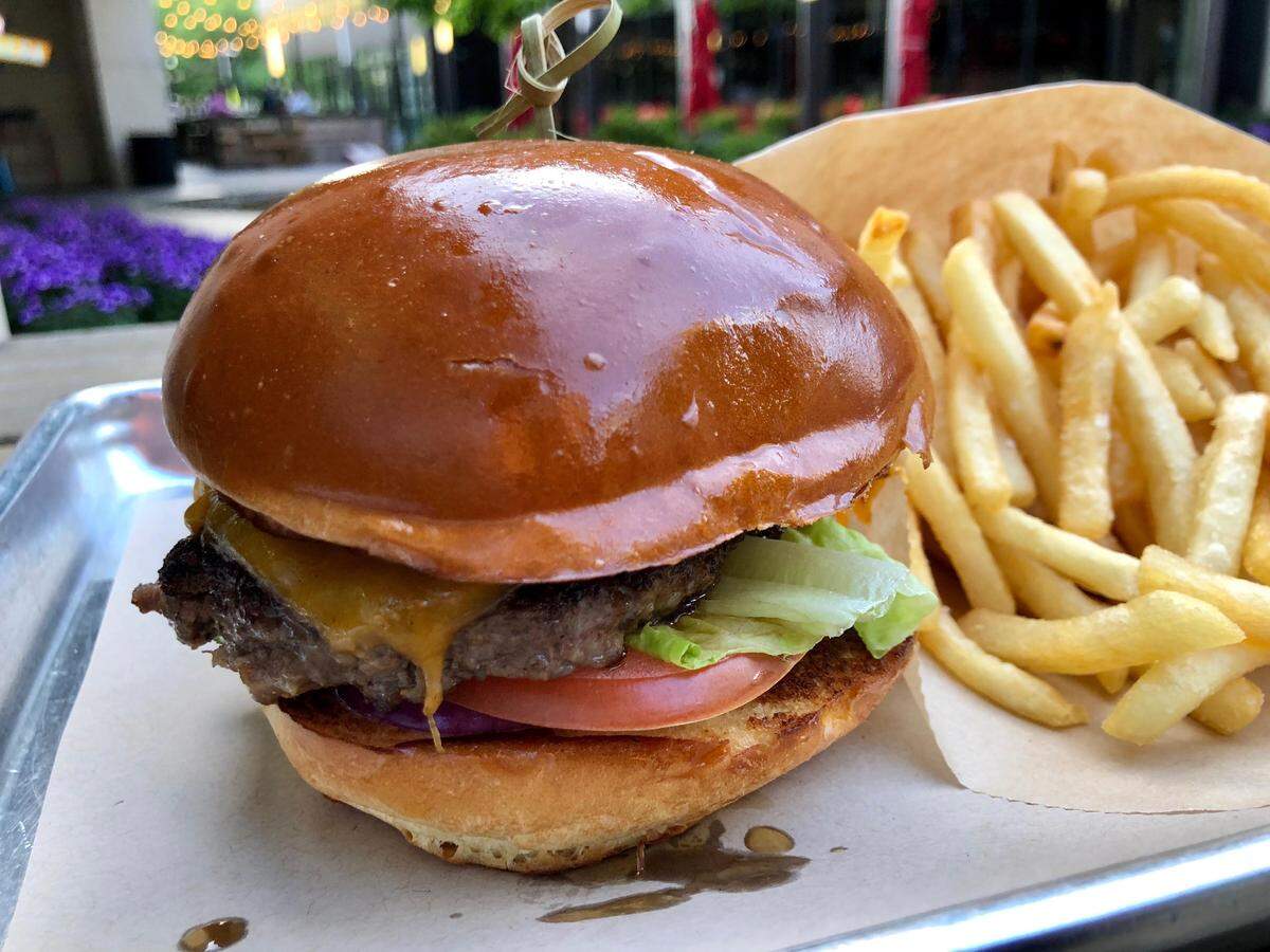 A Chop House Burger with fries (Parmesan-truffle optional).