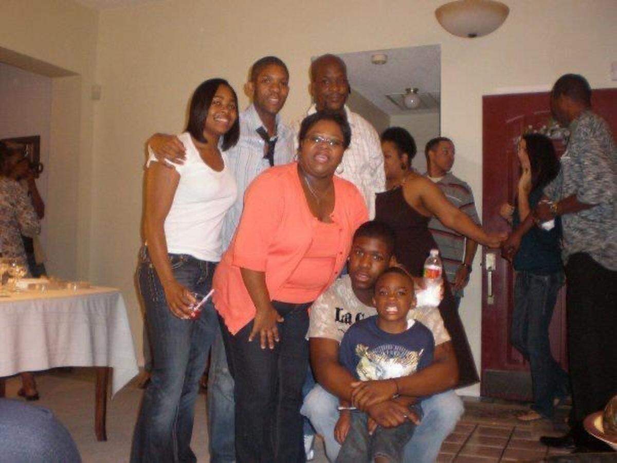 George Hawkins (back right) was fatally shot on Oct. 26, 2010. A decade later, Arlington police and Hawkins’ family ask that anyone with information about his death contact the police department to help them find closure.