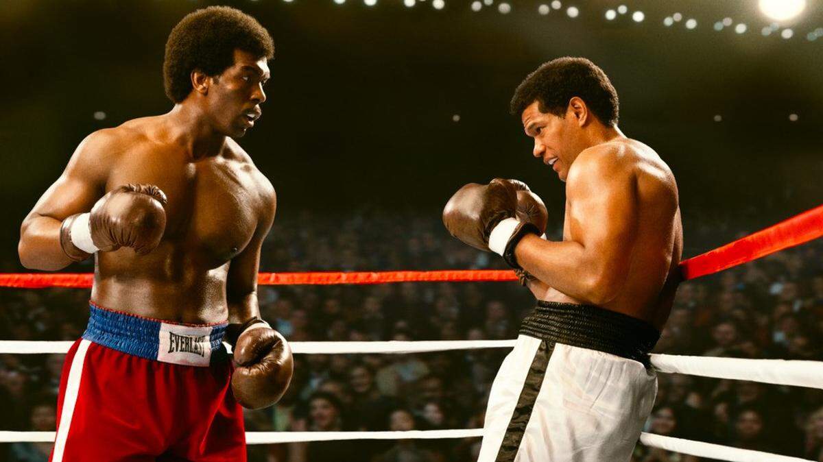 Actor Khris Davis (left) plays George Foreman in the new movie, “Big George Foreman: The Miraculous Story of the Once and the Future Heavyweight Champion of the World.” Actor Sullivan Jones plays the late Muhammad Ali.