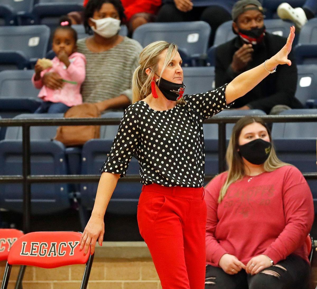 Legacy head coach Michelle Morris does some sideline coaching in the second half of a 8-5A district high school girls basketball game at Legacy High School in Mansfield, Texas, Friday, Jan. 22, 2021. Legacy defeated Timberview 46-21. (Special to the Star-Telegram Bob Booth)