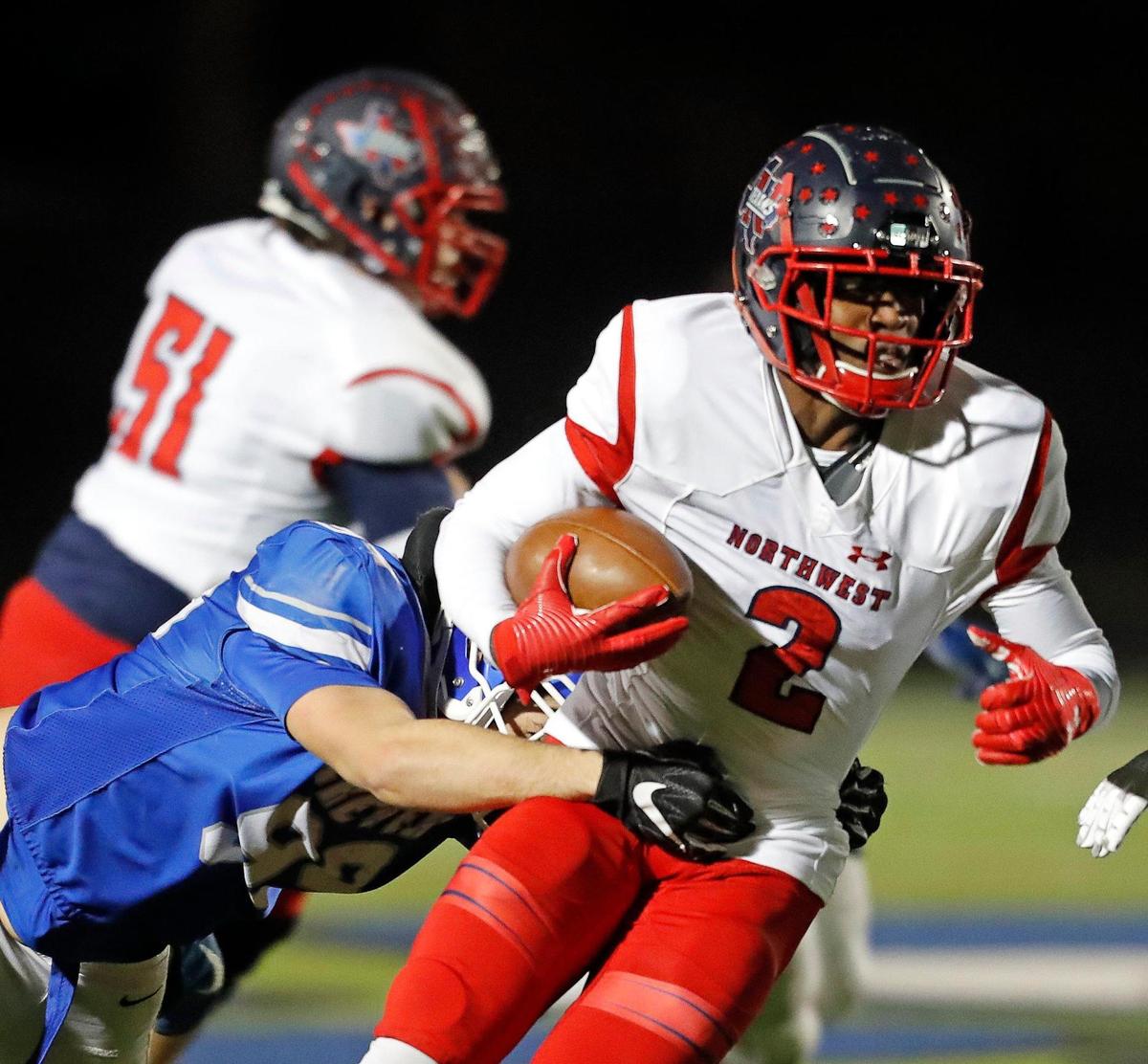 Northwest running back Ricardo Dyer (2) cuts back to the inside in a District 3-5A football game at Bear Stadium in White Settlement, Texas, Friday Oct. 29, 2021. Northwest defeated Brewer 42-17. (Special to the Star-Telegram Bob Booth)