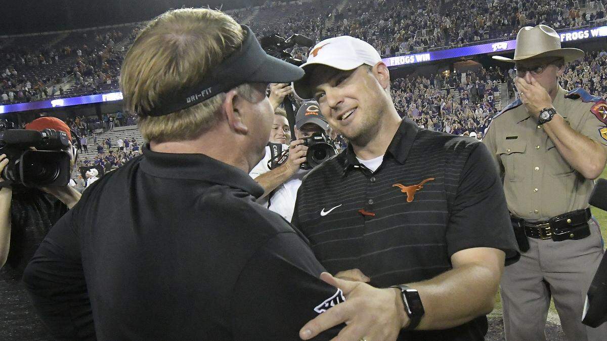 TCU Horned Frogs head coach Gary Patterson, left, and Texas Longhorns head coach Tom Herman shake hands after TCU beat Texas 24 to 7 at Amon G. Carter Stadium in Fort Worth, TX, Saturday, Nov. 4, 2017.  Herman is now 7-7 after a season-opening loss at Maryland on Saturday.