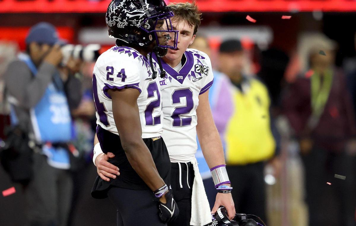 TCU quarterback Chandler Morris, right, comforts cornerback Josh Newton following their teams loss at the 2023 College Football Playoff National Championship on Monday, January 9, 2023, at SoFi Stadium in Inglewood, Calif.