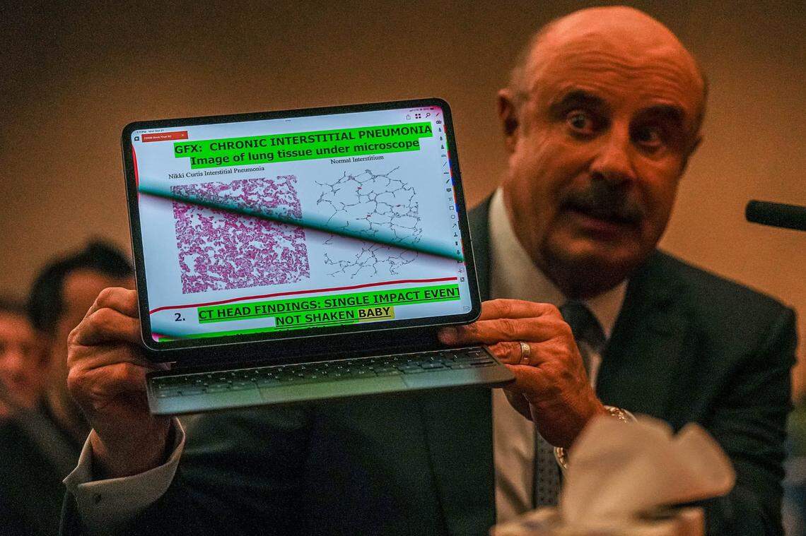 Dr. Phil McGraw testifies to the Texas House of Representatives Committee on Judiciary and Civil Jurisprudence on the trial of Robert Roberson in the Capitol Extension on Monday, Oct. 24, 2024. McGraw held up a laptop showing an image of lung tissue of Nikki Curtis, Robert Roberson's daughter. Roberson was convicted and sentenced to death for the death of his daugher in 2002.