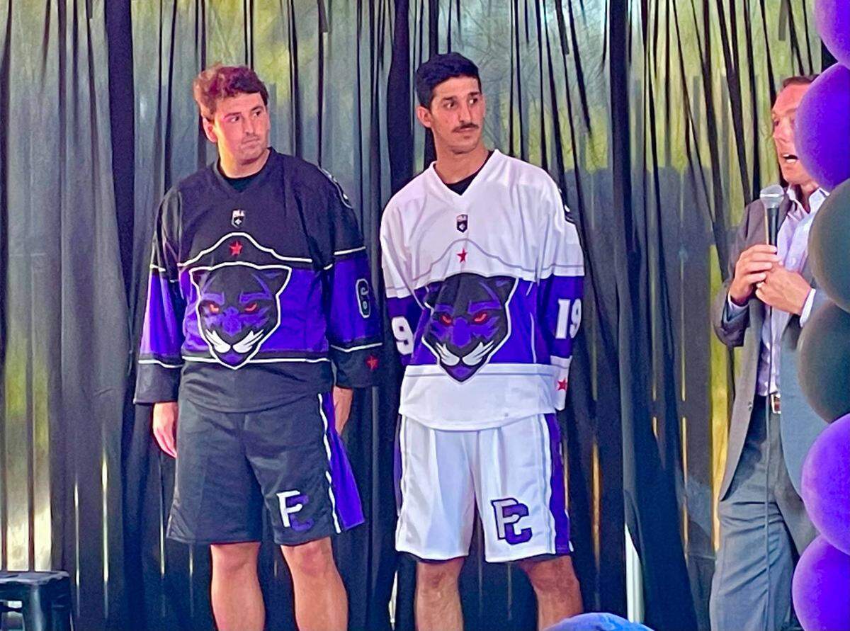Panther City Lacrosse Club players Charlie Kitchen (Left) and Phil Caputo along with president and CEO Greg Bibb at the team’s jersey unveiling in Fort Worth on Wednesday Aug. 11, 2021.