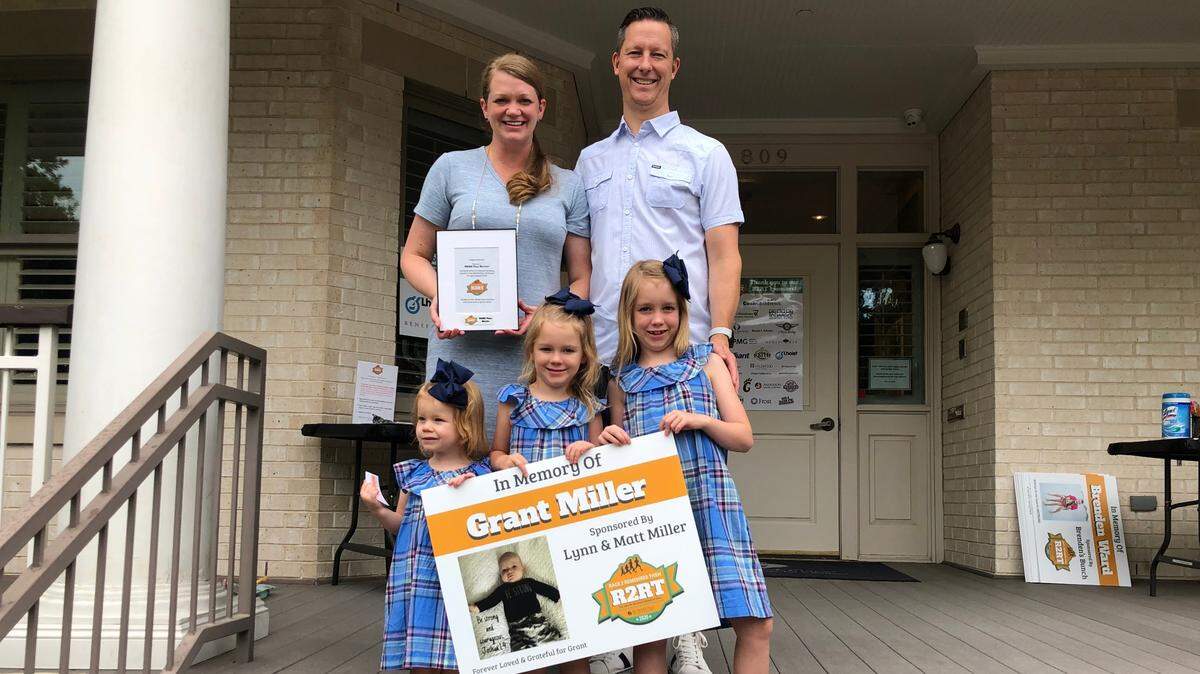 Matt and Lynn Miller pose with their daughters on the front steps of the WARM Place. The Miller family began working with the Fort Worth nonprofit after the death of their son Grant in 2019.