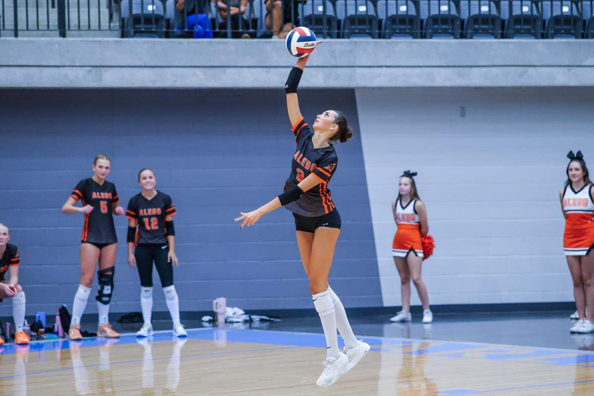 Aledo senior Alyssa Todd serves In Thursday’s bidistrict playoff game between Aledo and Colleyville Heritage at Arlington ISD Athletics Center, Thursday, Oct. 30, 2025.