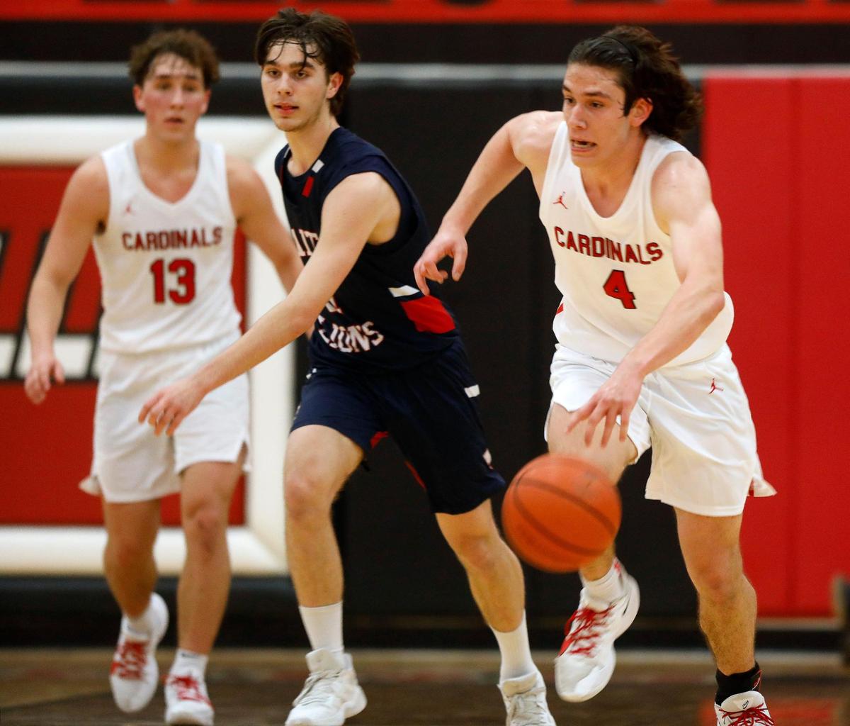 Fort Worth Christian’s Nate Bledsoe (4) brings a defensive rebound down court during the TAPPS 5A State Semifinal basketball game at Colleyville Heritage High School in Colleyville, Texas, Tuesday, March 09, 2021. Fort Worth Christian defeated Grapevine Faith 72-65. (Special to the Star-Telegram Bob Booth)