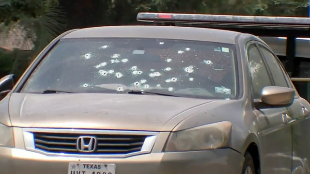 A woman was killed early Tuesday morning when she was fired upon after exiting her vehicle, Texas cops say.