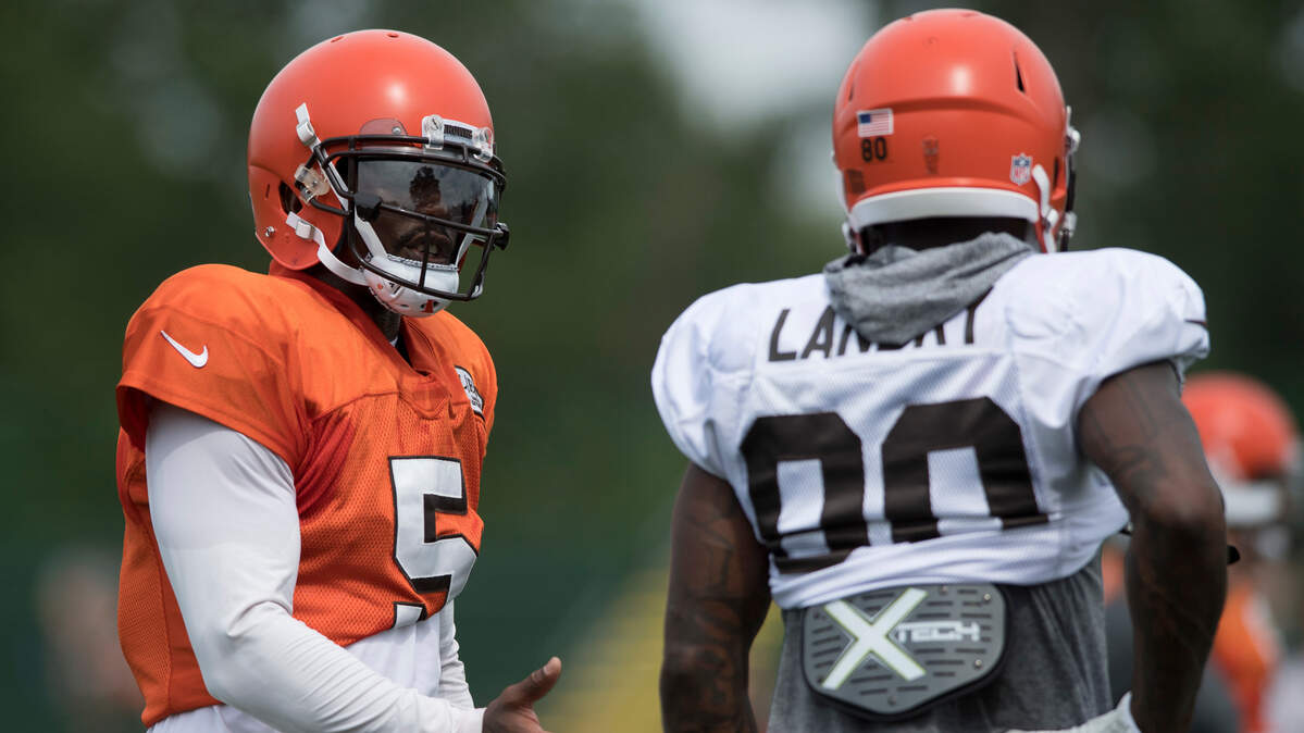 Cleveland Browns quarterback Tyrod Taylor talks with wide receiver Jarvis Landry during NFL football training camp Thursday, Aug. 2, 2018, in Berea, Ohio.