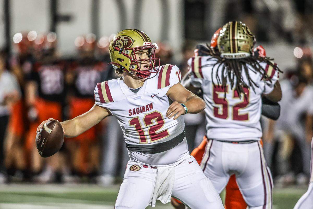 Saginaw quarterback Joshua Greek (12) throws the ball downfield against Aledo in a Class 5A Division I bi-district playoff game on Thursday, November 13, 2025 at Tim Buchanan Stadium in Aledo, Texas.