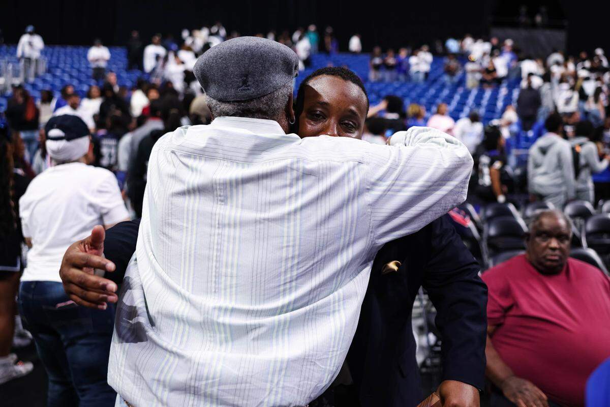 Mansfield Summit head coach Emund Prichett hugs his father after the Class 5A Division II state championship game against Beaumont United on Saturday at the Alamodome in San Antonio.