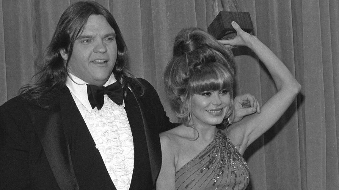 Rock star Meat Loaf is shown with Spanish singer Charo at the American Music Awards, Jan. 18, 1980 in Los Angeles