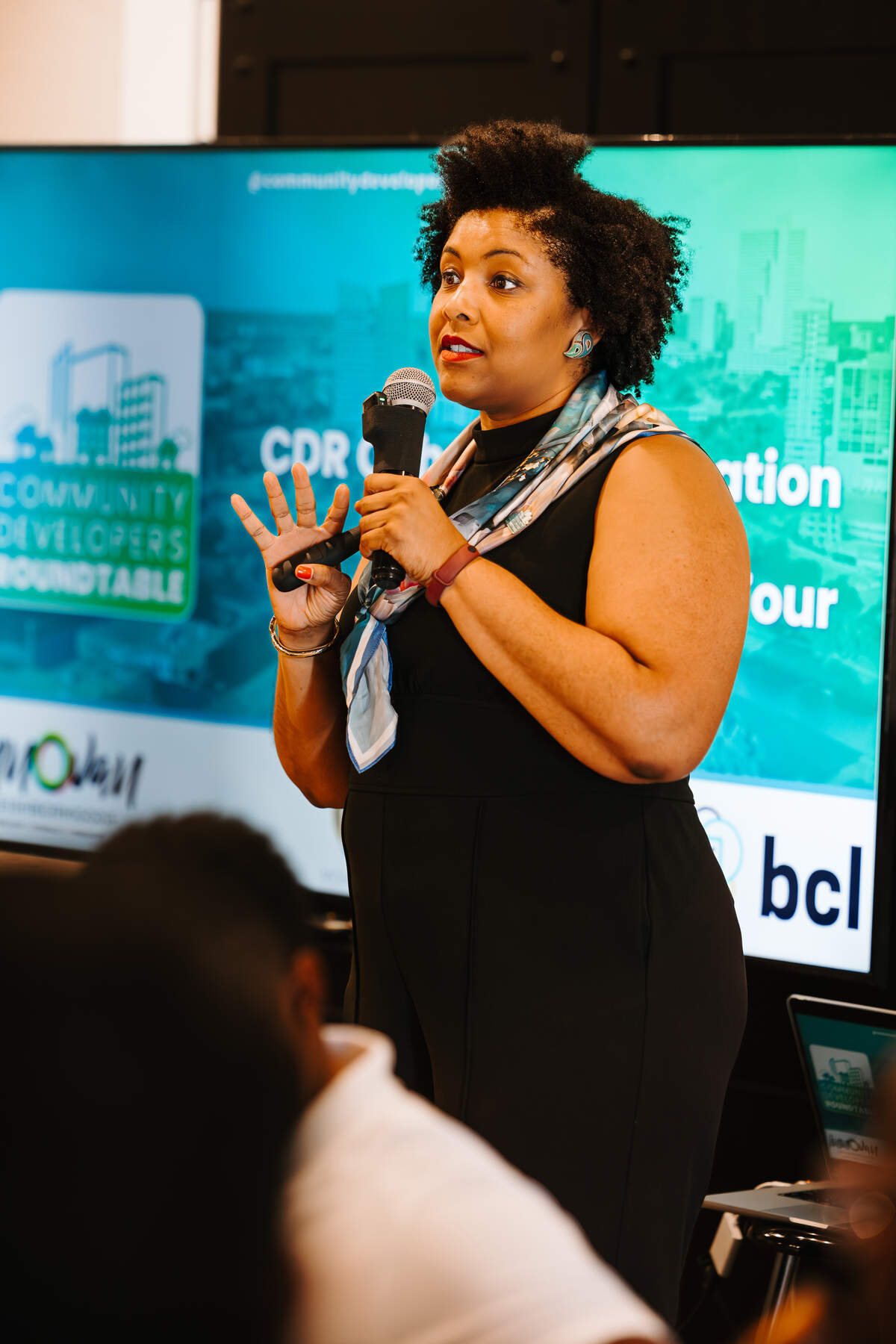 Maggie Parker speaking at Blank Space in east Fort Worth, concluding her first Fort Worth cohort for her program called Community Developers Roundtable on Wednesday. The program provides support and access to capital for local developers in the Dallas-Fort Worth metroplex.