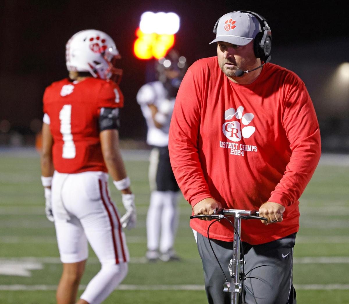Glen Rose head coach Cliff Watkins heads back to the sidelines during an UIL 4A D2 Region 1 Bi-district football playoff game at Kangaroo Stadium in Weatherford, Texas, Friday, Nov. 15, 2024.