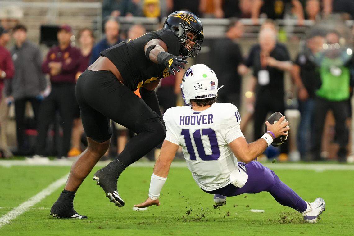 Sep 26, 2025; Tempe, Arizona, USA; Arizona State Sun Devils defensive lineman Elijah O'Neal (9) sacks TCU Horned Frogs quarterback Josh Hoover (10) in the first half at Mountain America Stadium, Home of the ASU Sun Devils. Mandatory Credit: Jacob Reiner-Imagn Images