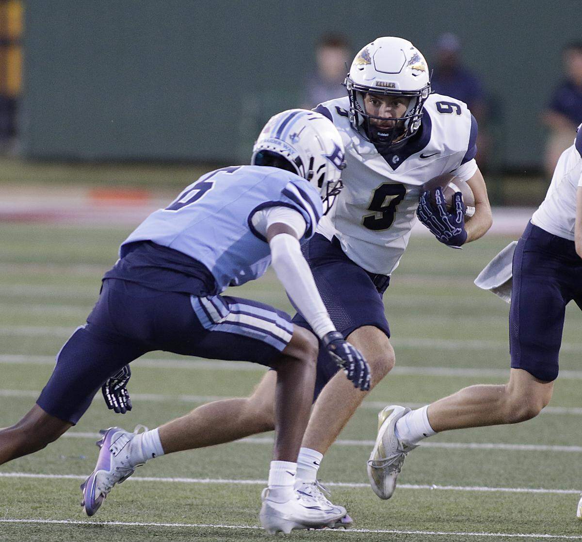 Keller’s Brock Meek picks up yardage against Keller L.D. Bell during their game at Pennington Field on Friday, Sep. 19, 2025 