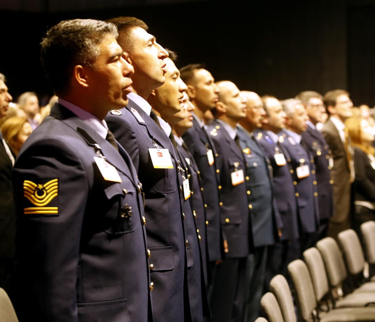 Members of the Turkish armed forces sing their national anthem during the Republic of Turkey F-35 rollout celebration at Lockheed Martin Thursday June 21, 2018. Dignitaries, Martin employees and media from both the US and Turkey attended the event.(Bob Booth)