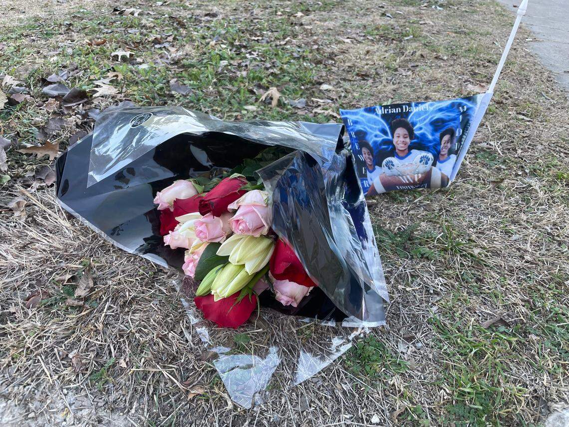 Neighbors say these flowers and the flag placed next to them were set out as a small memorial to one of the teens killed in a shooting in west Fort Worth on Wednesday night, Jan. 4, 2023.