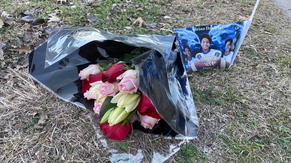 Neighbors say these flowers and the flag placed next to them were set out as a small memorial to one of the teens killed in a shooting in west Fort Worth on Wednesday night.