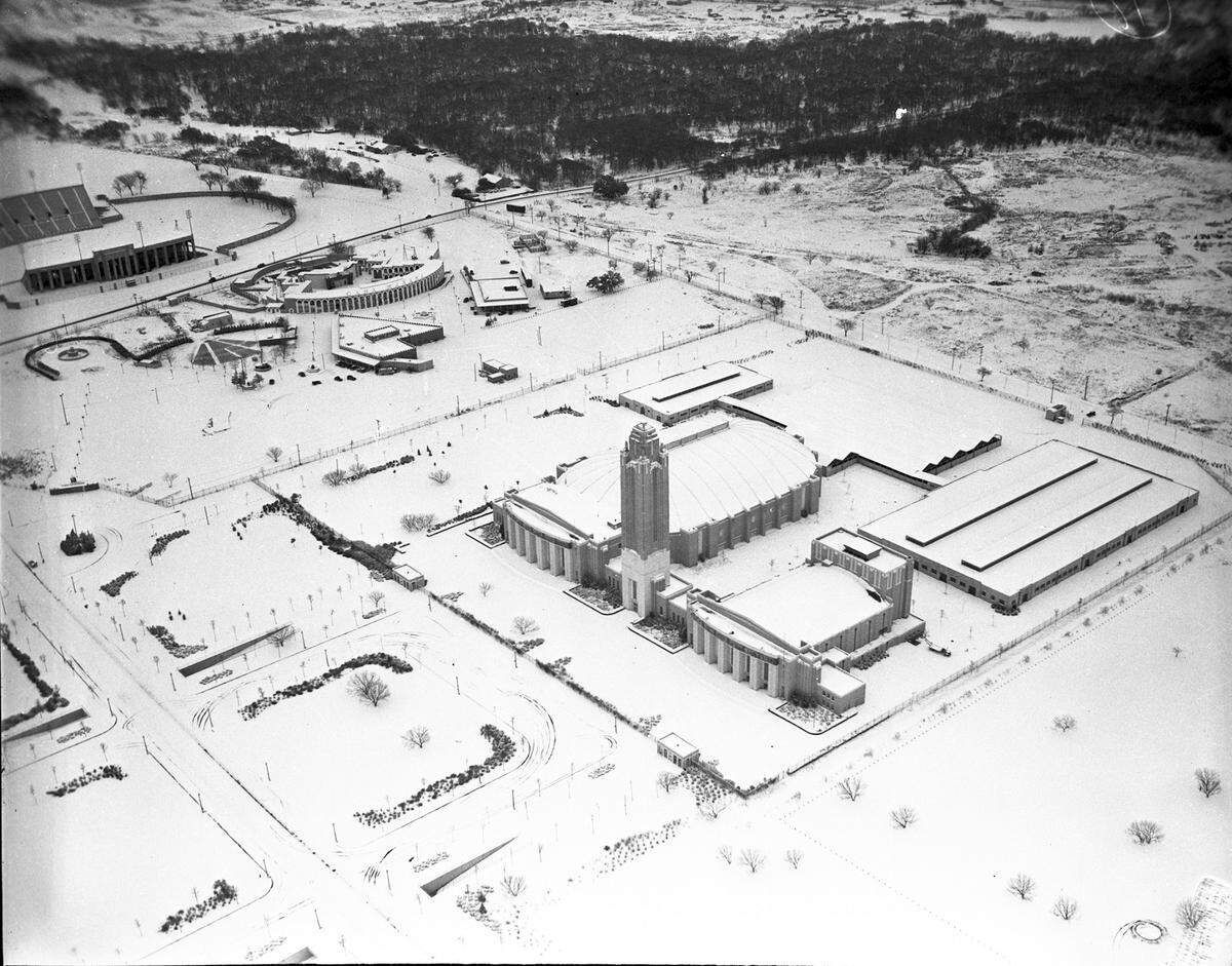 Jan. 22, 1940: “Air view of the Municipal Auditorium and the Will Rogers Memorial Coliseum, covered in snow. Several trees can be seen.”