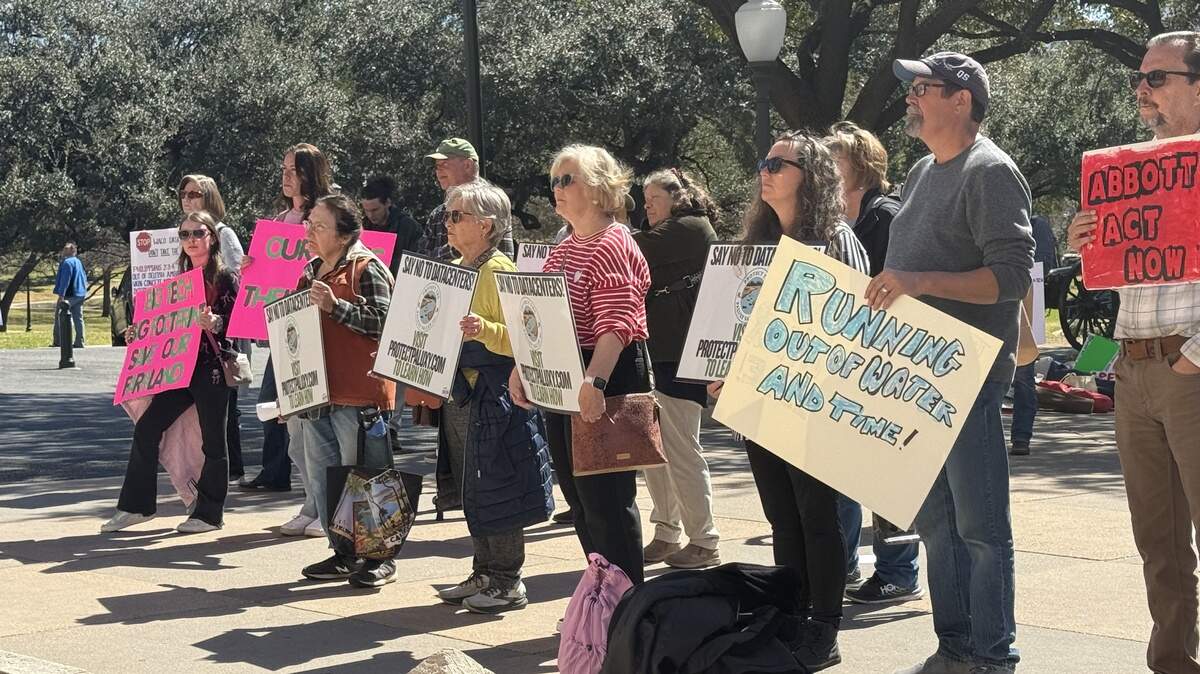 People gathered outside of the Texas Capitol on Feb. 23, calling for a special session on data center expansion in Texas.