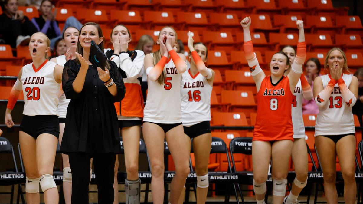 The Lady Bearcats celebrate a point during a UIL Region 1-5A Bi-District volleyball match at Wilkerson Greens Activity Center in Fort Worth, Texas, Tuesday, Nov. 05, 2024.