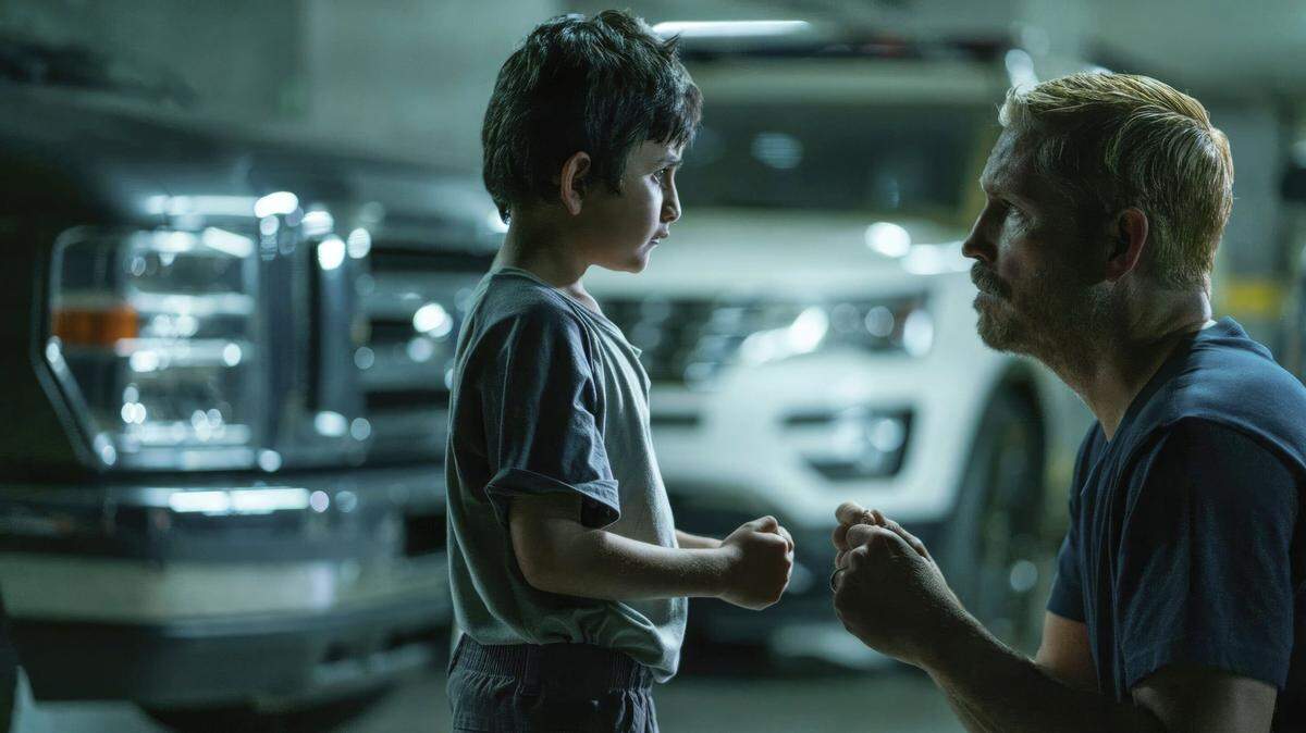 Lucás Ávila, left, with James Caviezel, the star of “Sound of Freedom,” an anti-trafficking movie that’s a breakout summer hit.