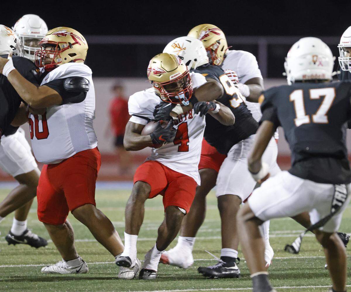 South Grand Prairie running back Josiah Lucas (4) is stopped as he attempts the middle of the line during the second half of a UIL football game between South Grand Prairie and Arlington Bowie at UTA Maverick Stadium in Arlington, Texas, Thursday Nov. 06, 2025.