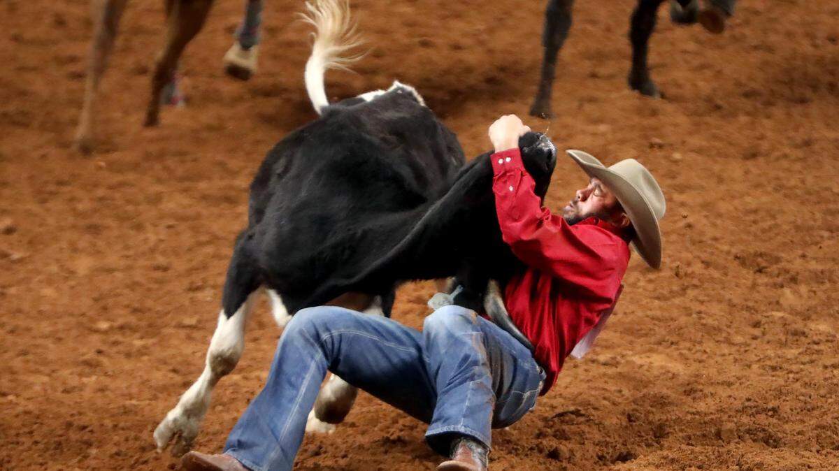 Arnold Laskey of Jones, Okla., competes in the steer wrestling event during the Cowboys of Color Rodeo on Monday, January 20, 2020.