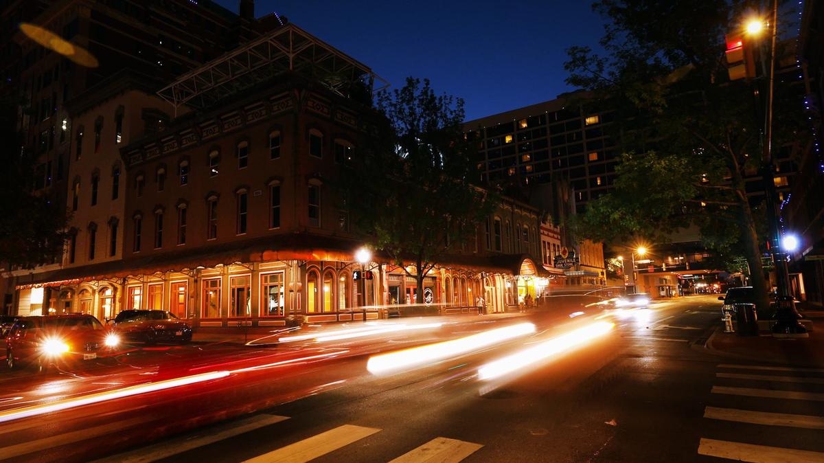 Traffic flows down Houston Street at the corner of West Third in downtown Fort Worth on Tuesday. Reata's owner says he moved his restaurant out of its longtime location at the corner in part because of a lack of communication from his landlords at Sundance Square.