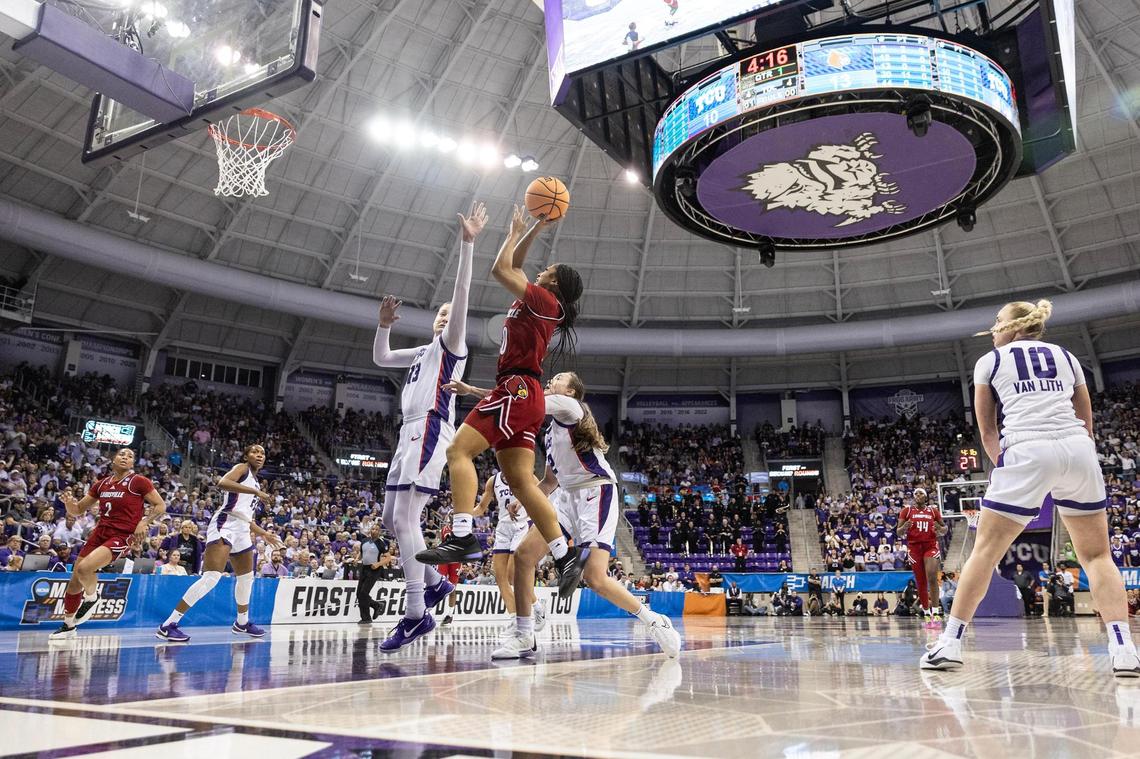 Louisville guard Jayda Curry (30) goes up for a layup over TCU center Sedona Prince (13) in the first half of the second round of the Women’s NCAA Championships Tournament game between TCU and Louisville at Schollmaier Arena in Fort Worth on Sunday, March 23, 2025.