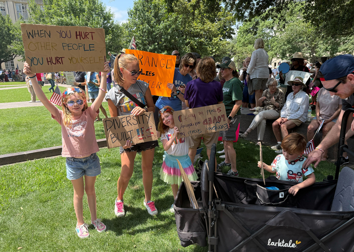 Caitlin Milligan attends the “No Kings” protest in downtown Fort Worth with her family on Saturday, June 14, 2025.