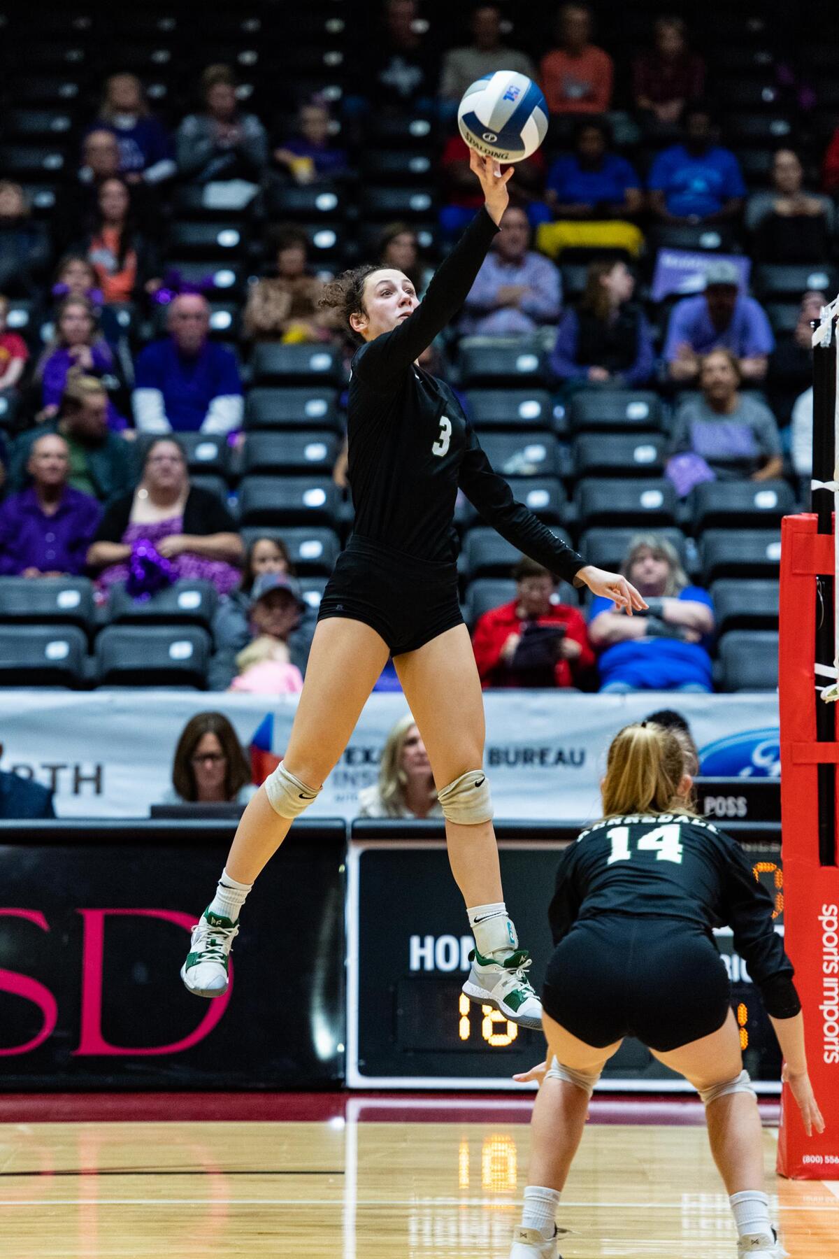 Madeline Pyles (3) tips the ball during the 4A state semifinal game against Lamar Fulshear on Thursday at the Curtis Culwell Center in Garland.