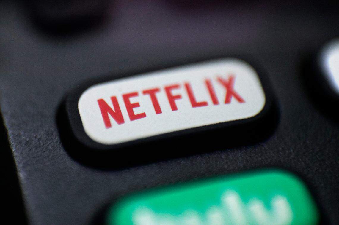 FILE - This Aug. 13, 2020, file photo shows a logo for Netflix on a remote control in Portland, Ore. (AP Photo/Jenny Kane, File)