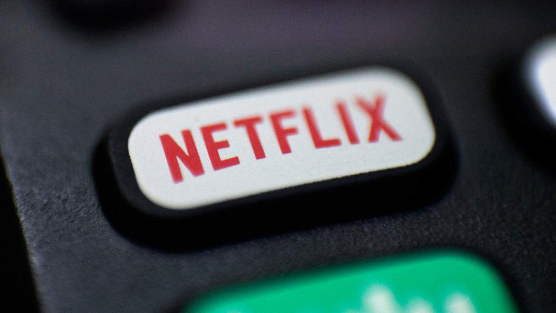 FILE - This Aug. 13, 2020, file photo shows a logo for Netflix on a remote control in Portland, Ore. (AP Photo/Jenny Kane, File)
