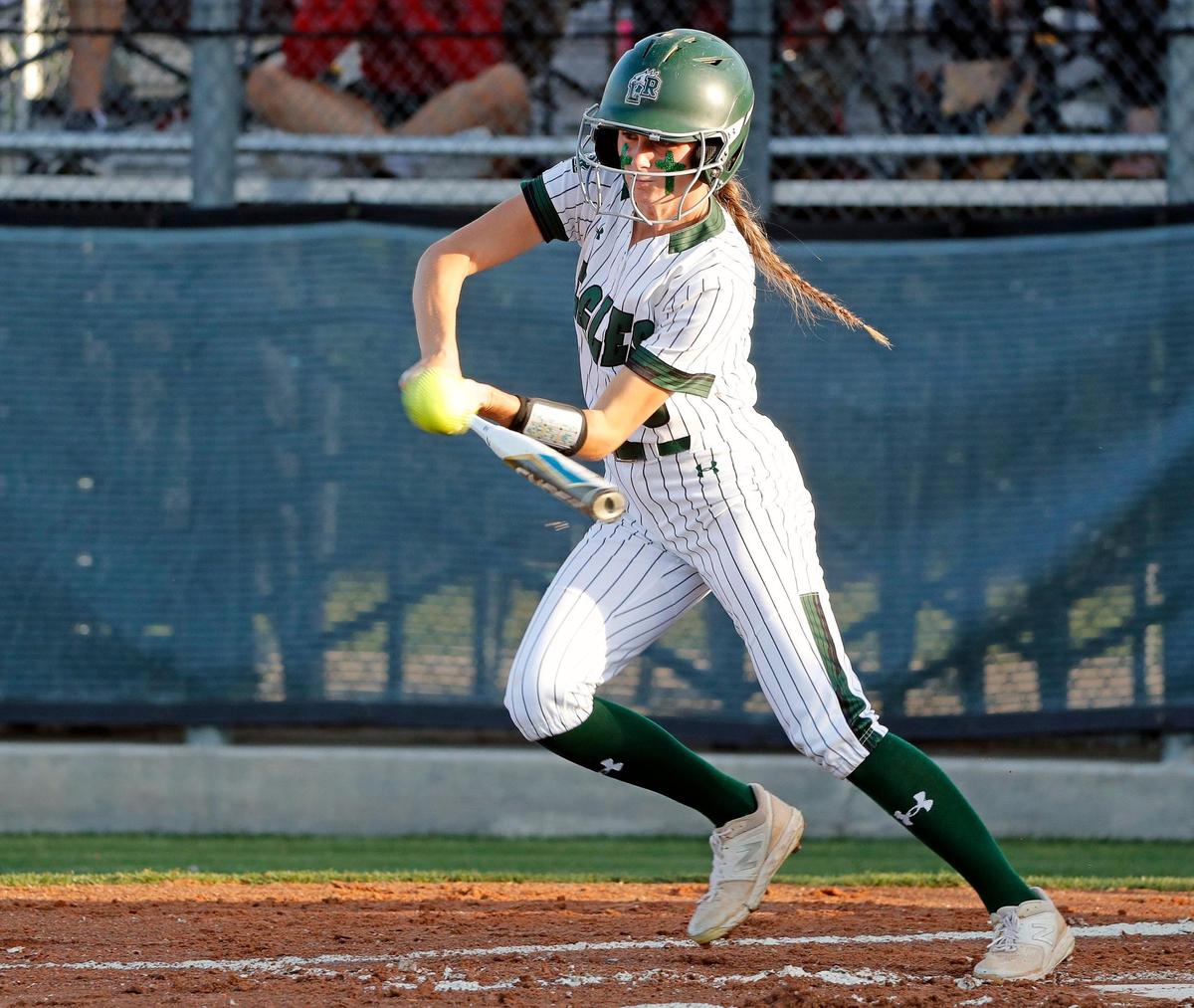 Lake Ridge center fielder Tia Warsop (5) gets a base hit during a UIL 6A Region 2 area round softball name at Lake Ridge High School in Mansfield, Texas, Friday, May 06, 2022. Warsop was the winning run in the game. Lake Ridge defeated Tyler Legacy 6-3 on 16 hits and no errors to move on to the next round. (Special to the Star-Telegram Bob Booth)