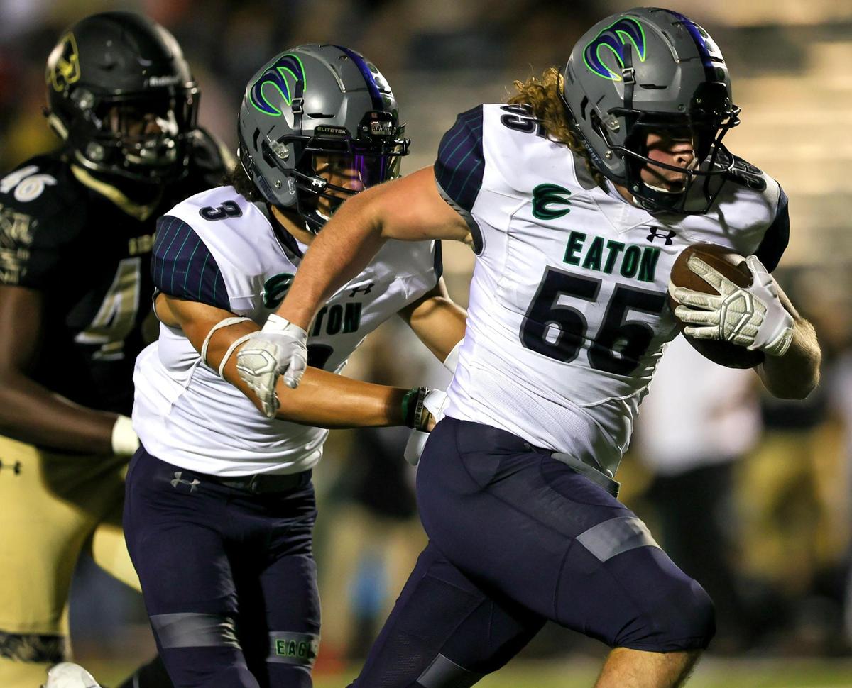 Eaton linebacker Brock Hayward (55) goes 19 yards for a touchdown after a muff punt by Keller Fossil Ridge during the first half of a high school football, October 22, 2020 played a Keller ISD Stadium in Keller, Tx. (Steve Nurenberg Special to the Star-Telegram)