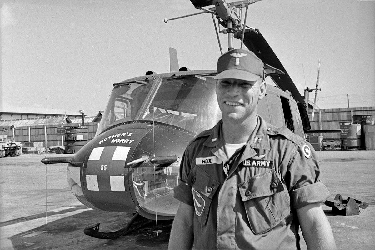 U.S. Army Lt. Bob Wood of Fort Worth, who rescued wounded soldiers from battlefields in Vietnam. Wood is pictured in front of a Bell UH-1 Iroquois (”Huey”) military helicopter named “Mother’s Worry.”