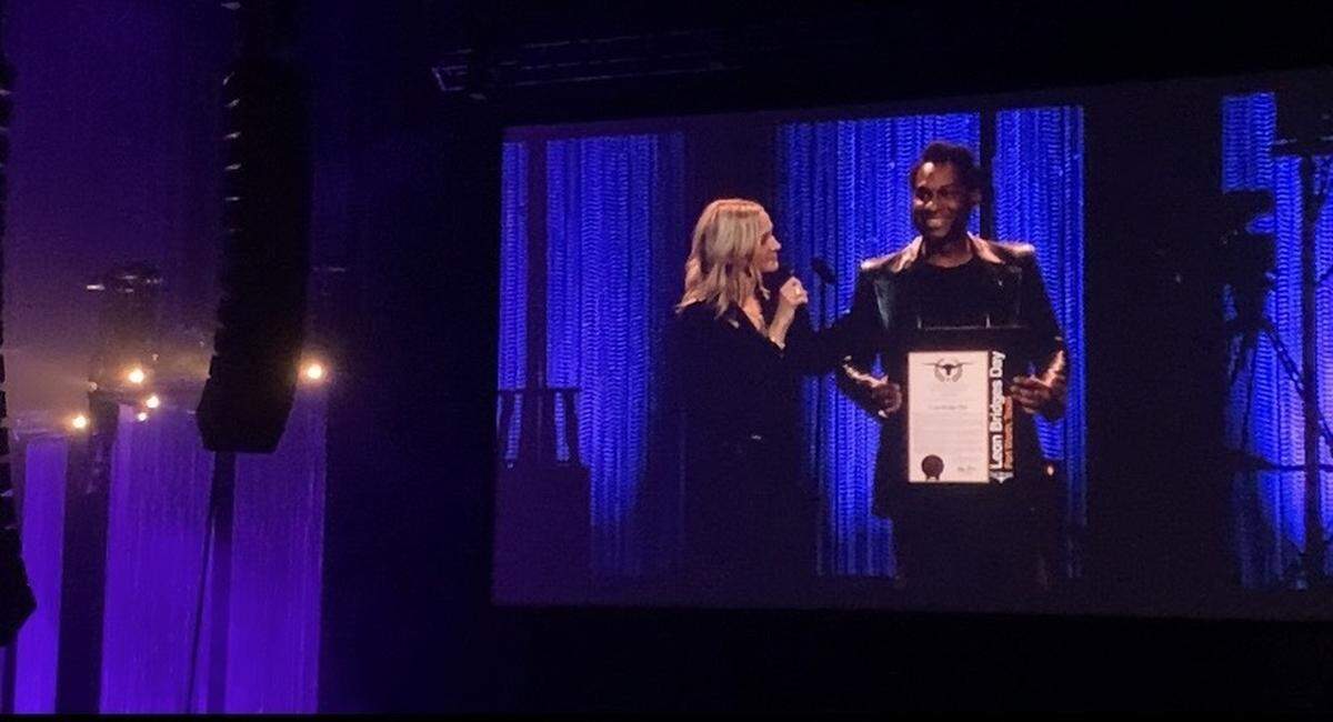 Fort Worth Mayor Mattie Parker presents singer Leon Bridges with a proclamation Friday at Dickies Arena that November 15 will henceforth be known as Leon Bridges Day, in honor of the singer’s contributions to the city.